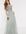 Lange bardot-bruidsmeisjesjurk van tule met bovenlaag van delicate lovertjes in kleurschakeing in saliegroen
