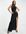 Lange jurk met vetersluiting en dijhoge split in zwart