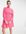 Mini-jurk van biologisch katoen met open, gestrikte achterkant en mouwen met detail in roze