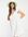 – Kleid mit Lochstickerei mit V-Ausschnitt und Rüschen-Overlay in Weiß
