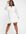 Shirred waist skater mini dress with flippy hem in ivory-White
