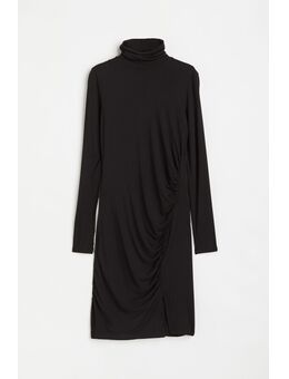 Nauwsluitende Jurk Met Turtleneck Zwart Alledaagse jurken in maat XS. Kleur: Black