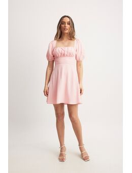 Mini-jurk met pofmouwen en gestrikte achterkant - Pink