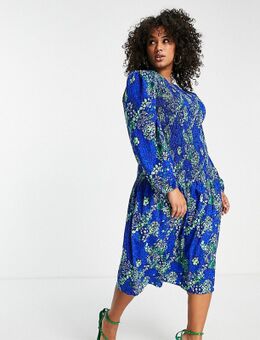 Halflange gesmokte jurk in blauw met luipaardprint