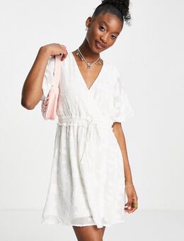 Mini-jurk van kant met V-hals en gestrikte taille in wit